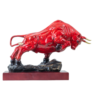 13.4-inch red patina charging bull sculpture, front view.