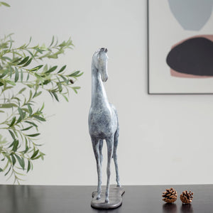 White bronze minimalist horse sculpture front full body view on white background showing elongated form