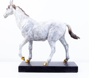 20.8-inch white bronze walking horse sculpture with golden hooves on marble base, side front view