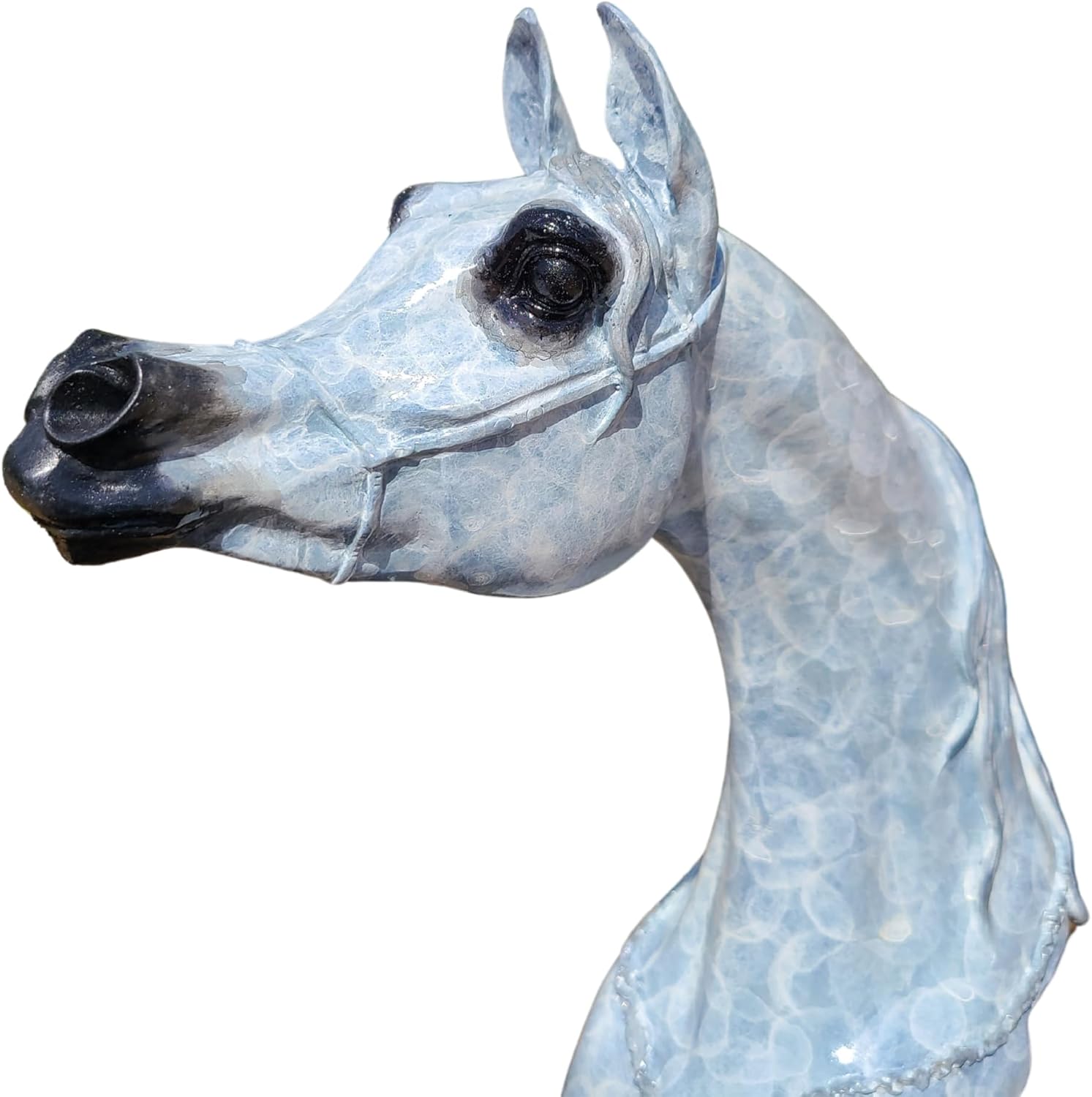 Close-up front detail of white patina bronze Arabian horse head sculpture showing textured mane and ears