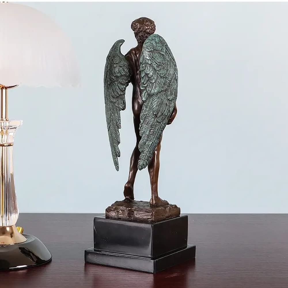Back view of winged David bronze sculpture on dark wood desk showing spread wings and marble base