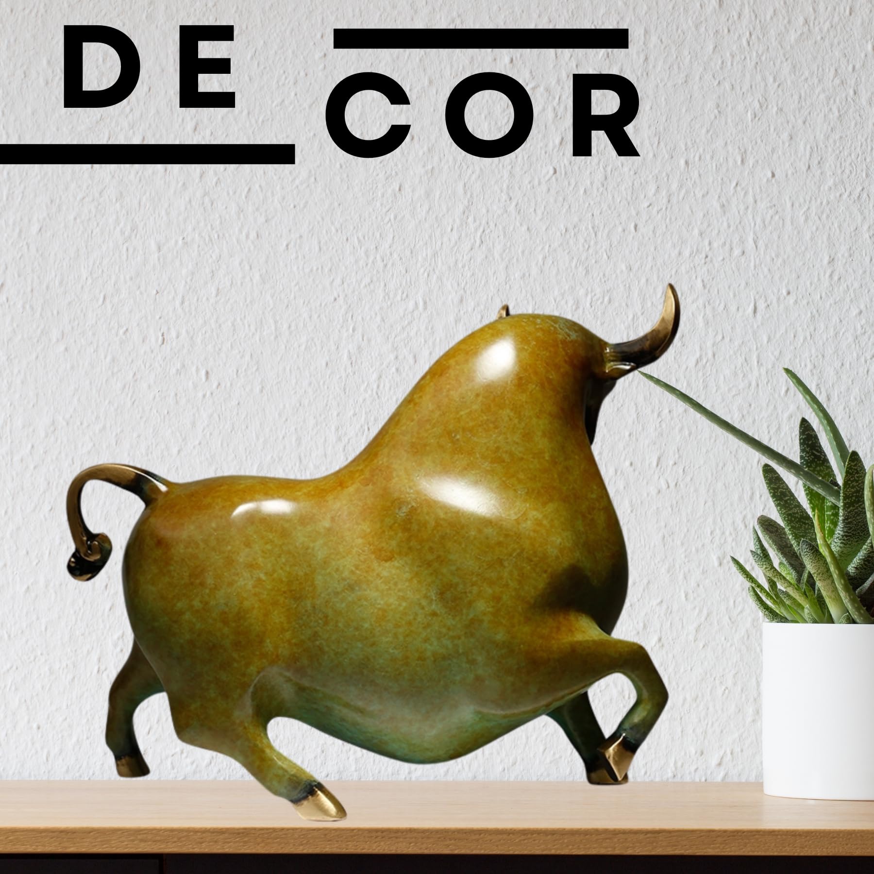 Close-up of the bull head with brass horn details and patina finish.